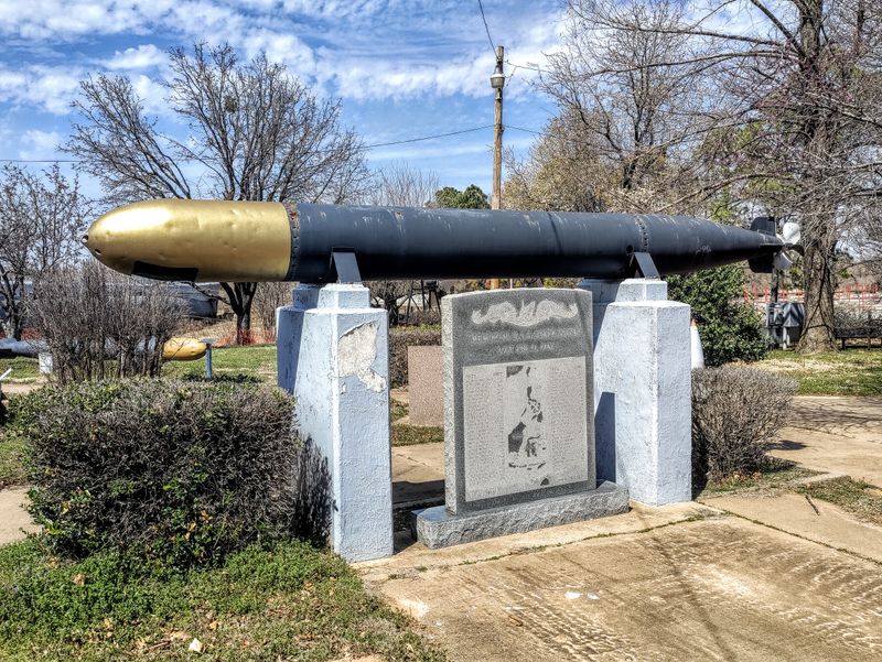 Naval Guns and Torpedo Casings Dot the Landscape