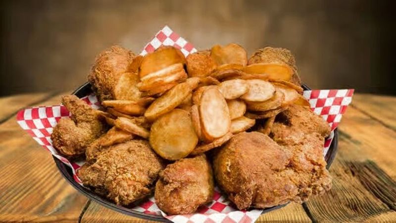 Legendary Fried Chicken Alongside Pizza