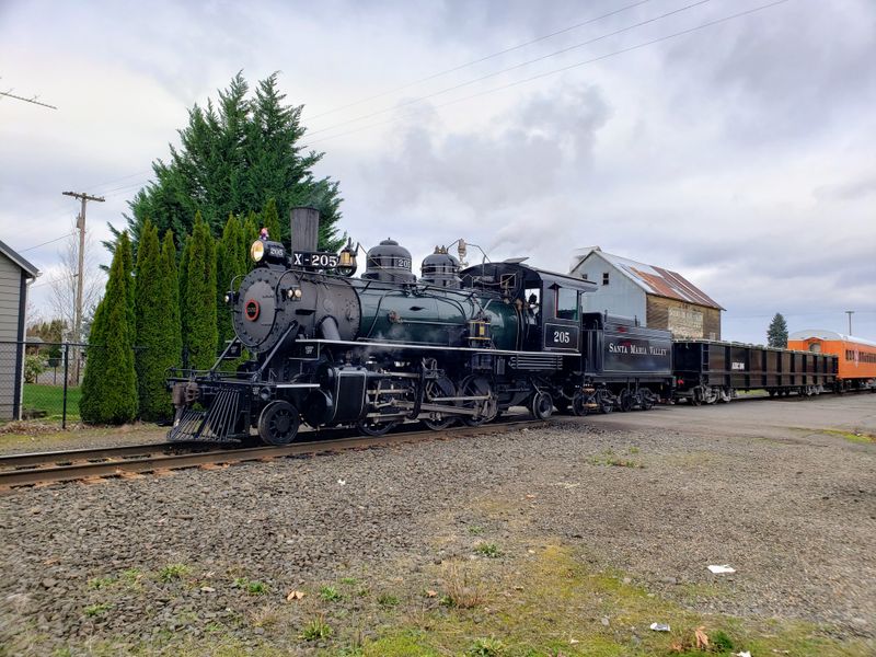 Historic Steam Locomotive Rides Behind Santa Maria