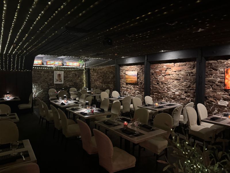 Exposed Brick Walls and Original Pine Flooring Create Authentic Ambiance