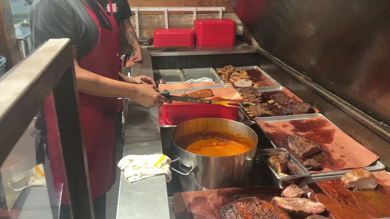 Choosing Your Meat Directly From The Pit Master