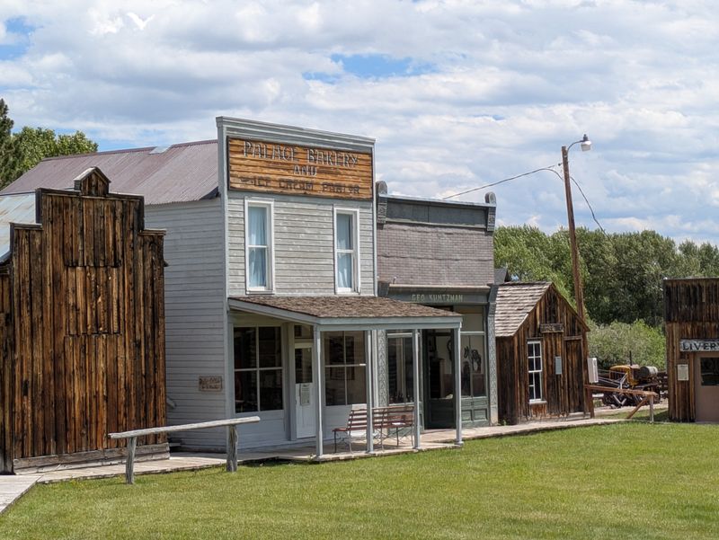 Encampment’s Quiet Main Street And Snowy Mountain Edges