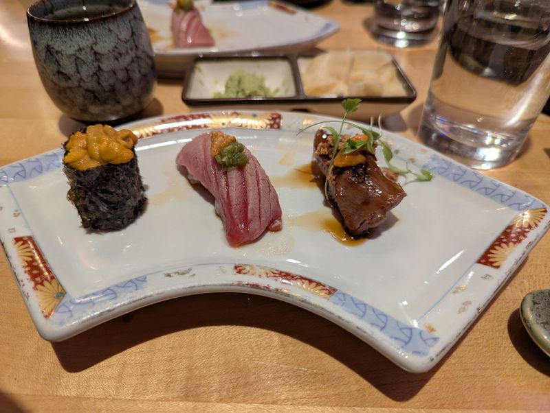 Three Glasses of Sake Included