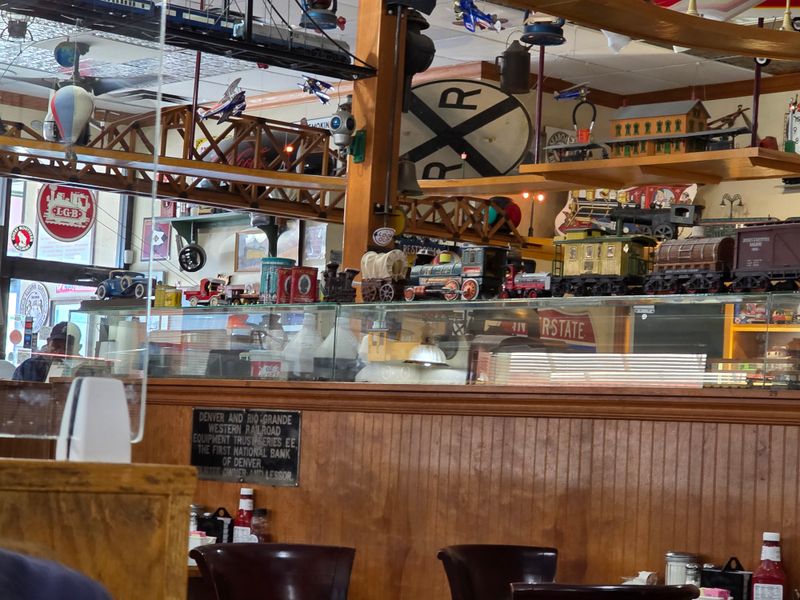 Model Trains Running Overhead While You Eat