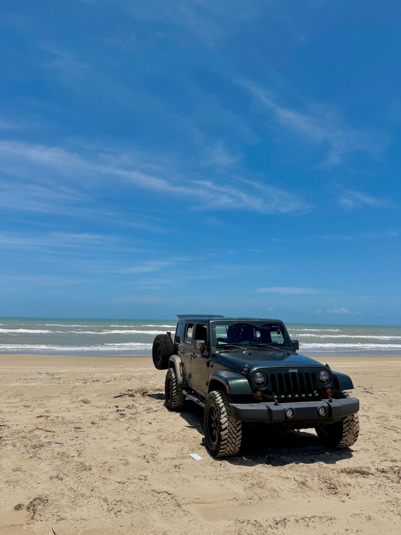 Four-Wheel Drive Chaos on Soft Sand