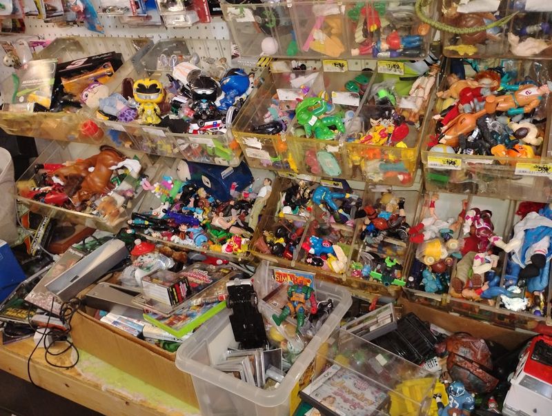 Collectibles And Antiques Hide Among Tables