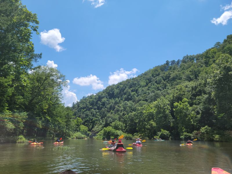 Kayaking and Paddle Boats Explore the Waters