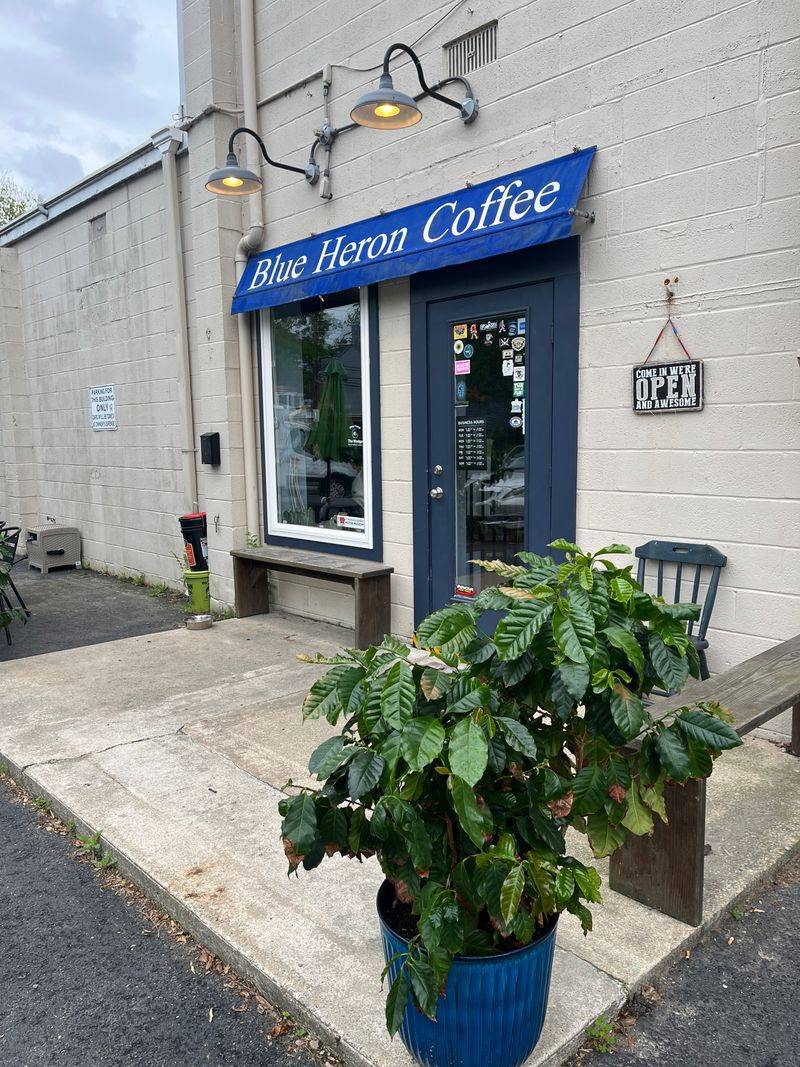 Brick Sidewalk Strolls Past Shops And Little Cafes