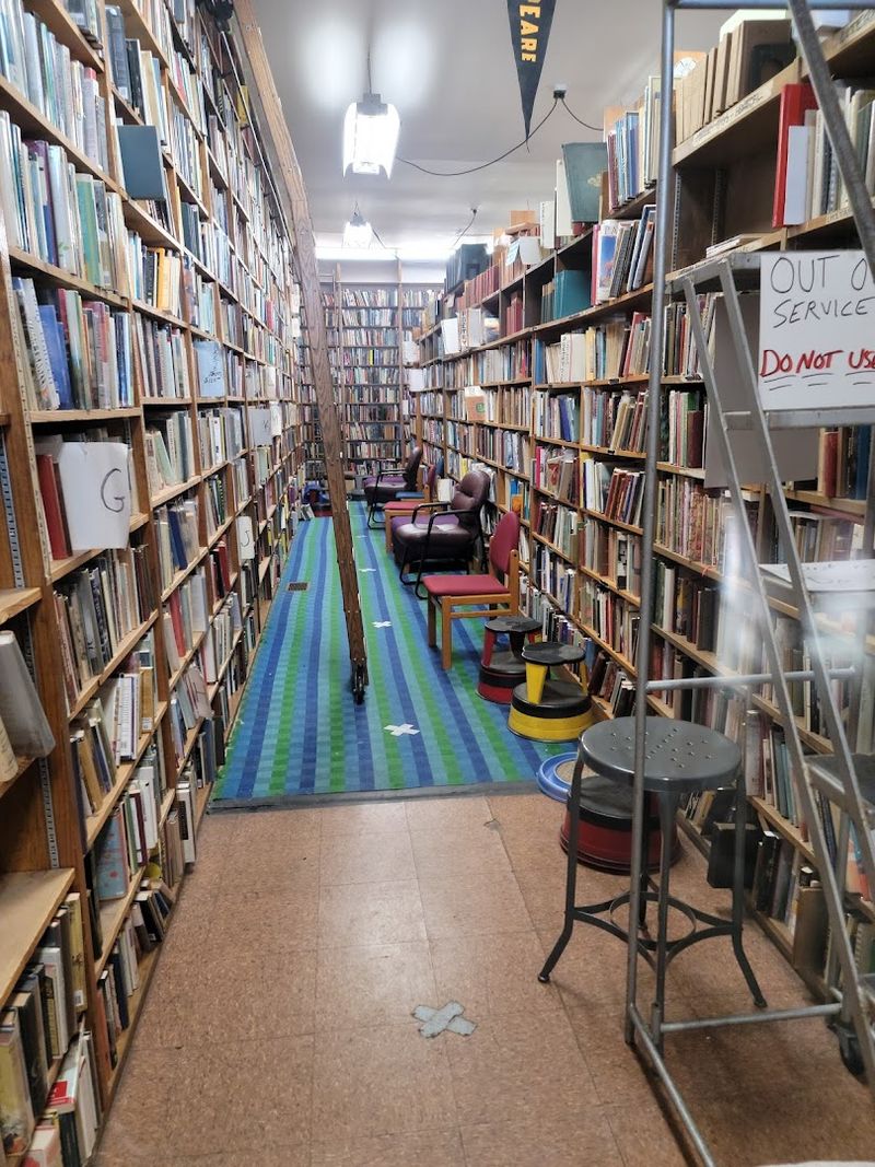 Floor-to-Ceiling Shelves and a Rolling Ladder Worth the Trip Alone