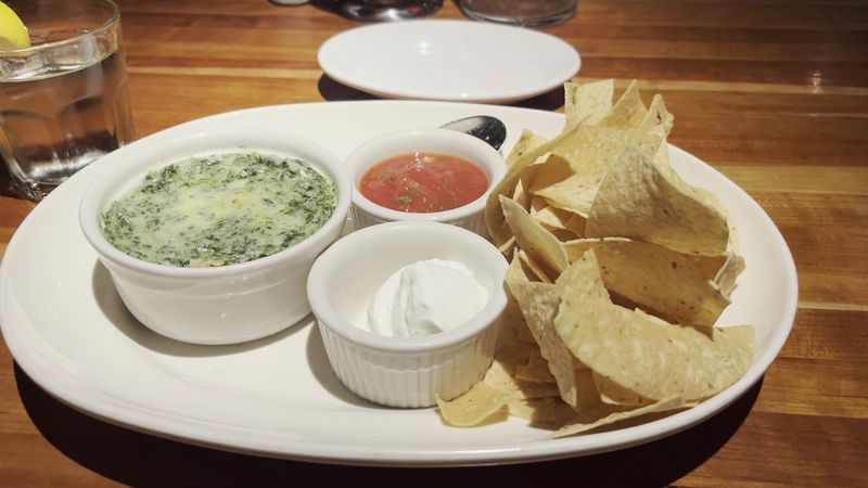 The Spinach Artichoke Dip Worth Arriving Early For