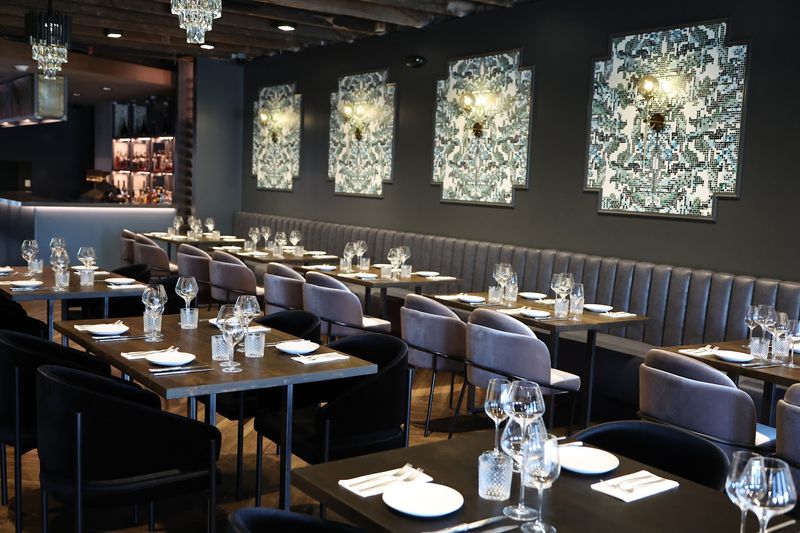 The Intimate Second-Floor Setting That Sets the Mood Immediately