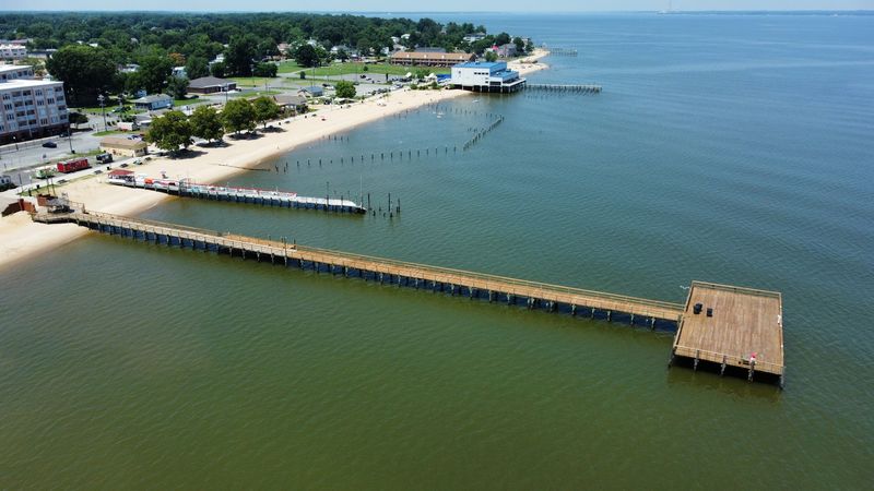 The Pier That Breathes Differently After Dark
