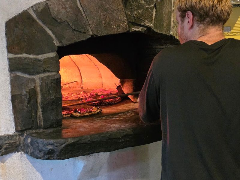 The Wood-Fired Oven at the Heart of It All