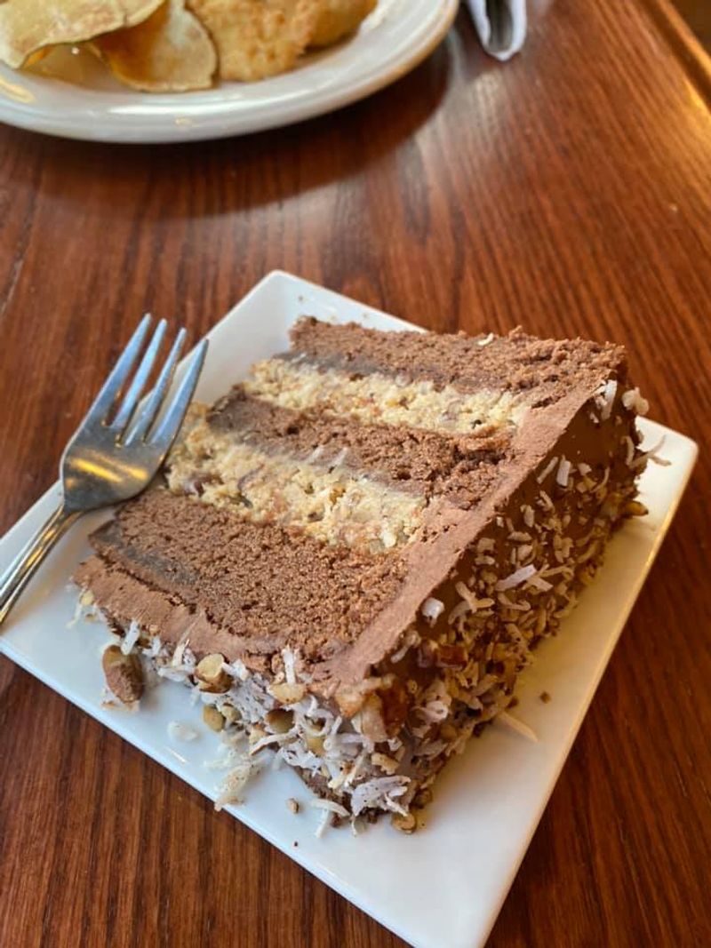 A Cafe Connected to a Charming Sweet Shop Full of Chocolates and Cakes