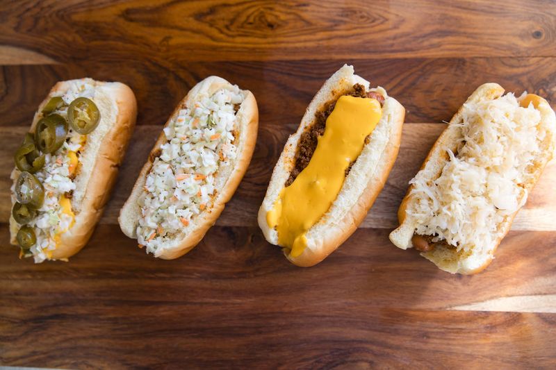 Build Your Dog With Cheese, Slaw, Onion, Or Keep It Classic