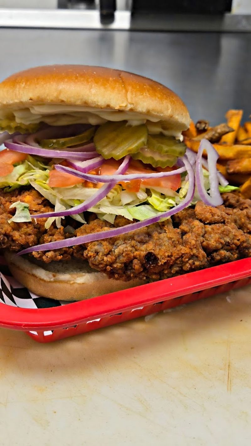 The Holy Cow Chicken Fried Steak Sandwich Is Oklahoma Comfort on a Bun