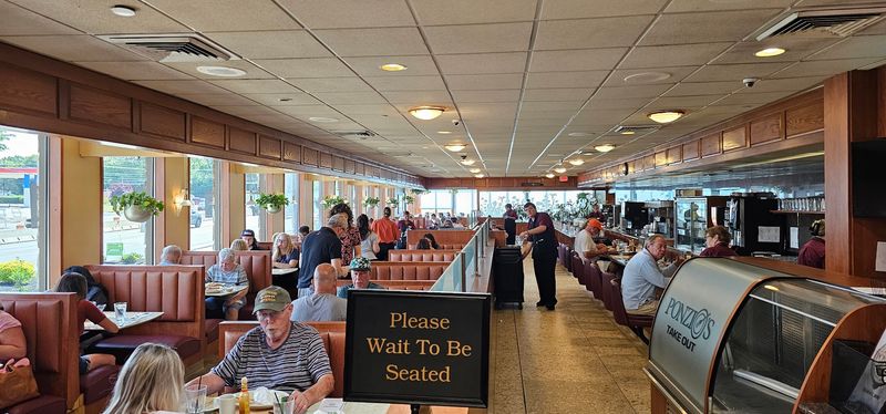The Atmosphere: Big Booths, Bright Lights, and That Familiar Diner Hum