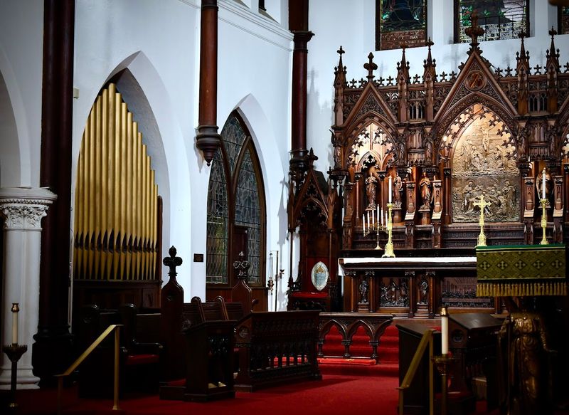 The Hand-Carved Altar and Reredos Inside