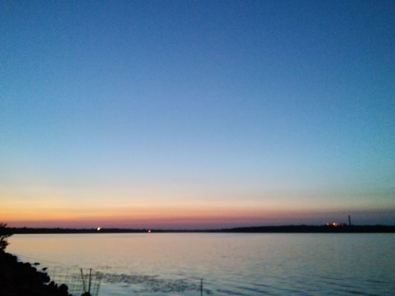 Sunrises And Sunsets Over The Water Are Worth Waking Up For