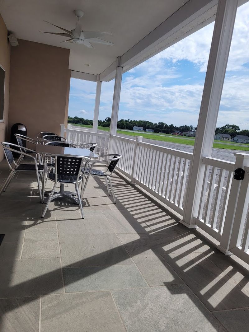 Outdoor Patio Seating Right on the Active Runway