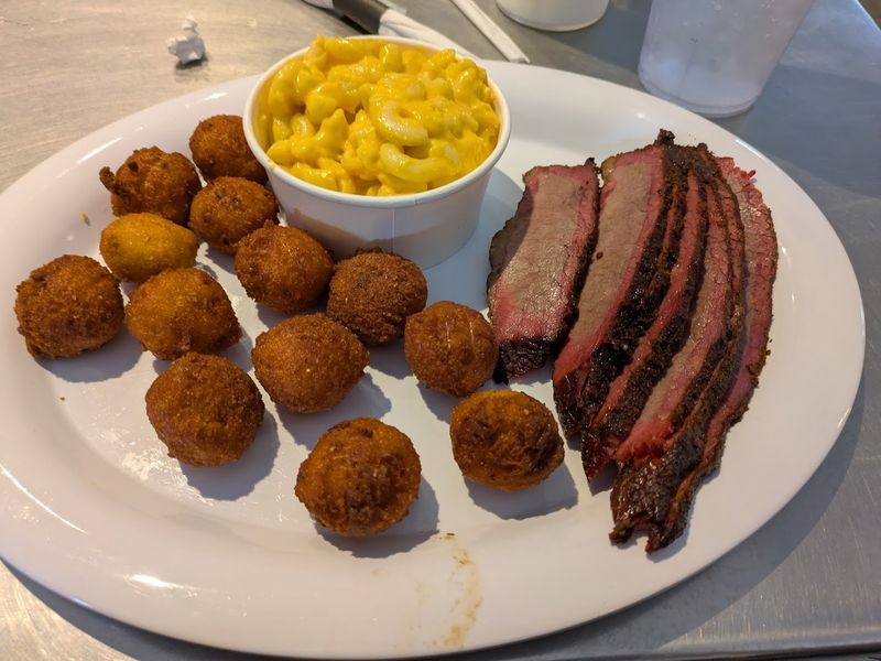 Pit-Cooked Meats Smoked Over Real Hardwood Daily