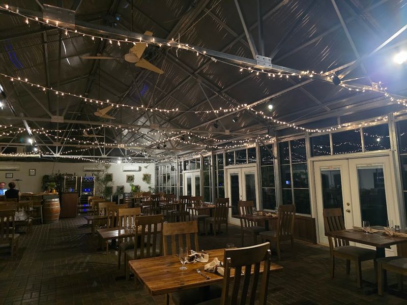 A Glass Greenhouse Perched Above the Potomac