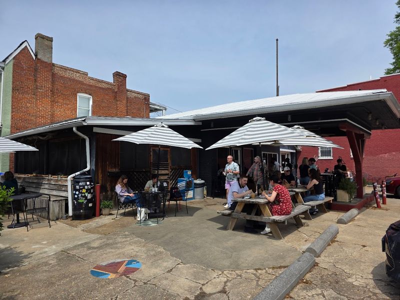 The Neighborhood That Sets the Mood Before You Even Walk In