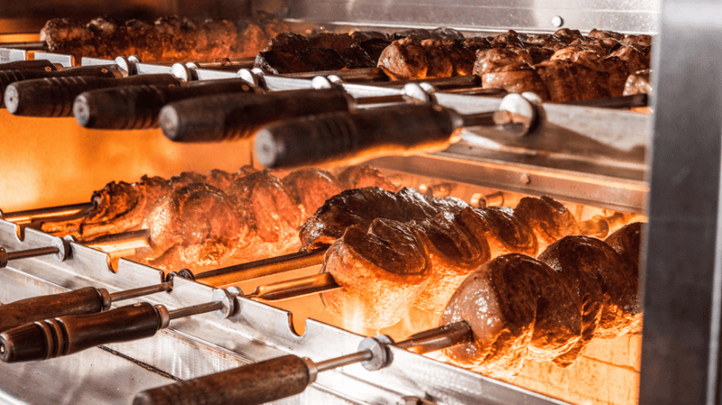 The Churrasco Experience: What Brazilian-Style BBQ Actually Means