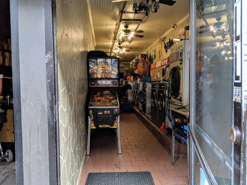 A Real Laundromat Up Front With A Pinball Arcade Hidden In Back