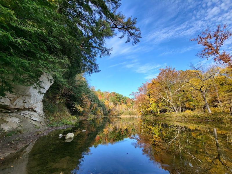 Canoeing Sugar Creek Through Towering Sandstone Cliffs