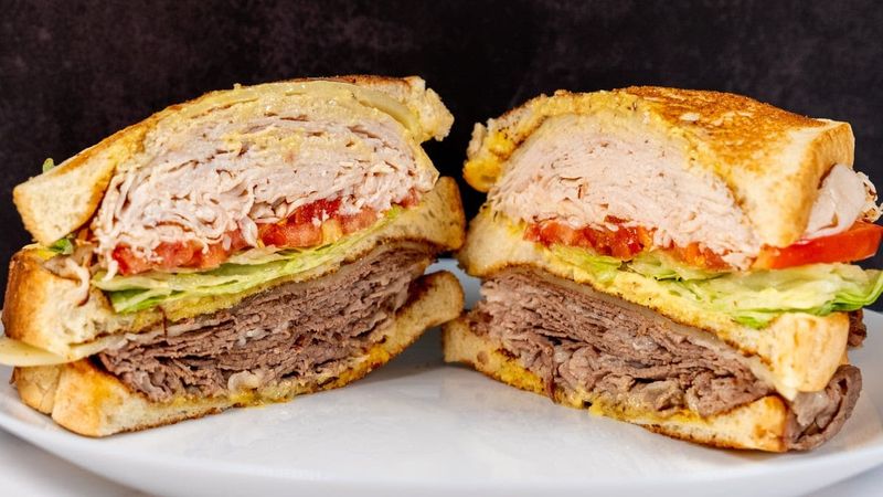 Sky High Corned Beef Stacks That Make One Sandwich Feel Like Two
