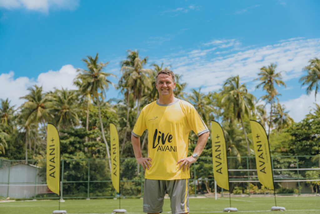 Michael Owen runs the youth soccer camp at this Maldives Resort. Photo c. Avani+Fares Resort.