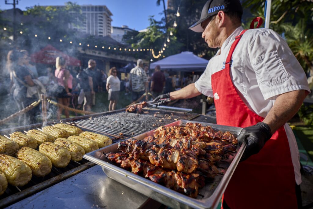 Hilton Hawaiian Village runs family barbecues in their 22-acre tropical gardens. Photo c. HHV Hilton