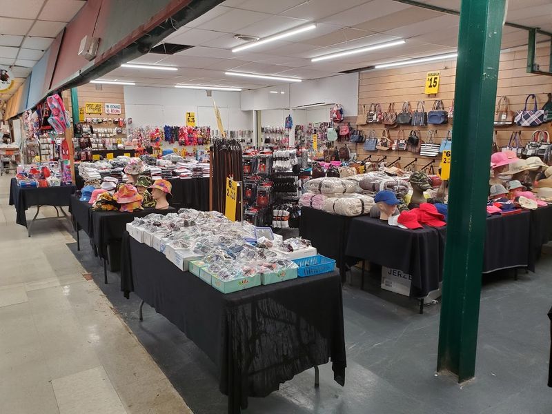Rows Of Vendors Inside Two Indoor Flea Market Barns