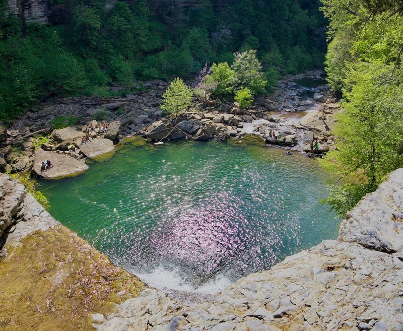 Sunbeams Dancing Across The Misty Swimming Hole