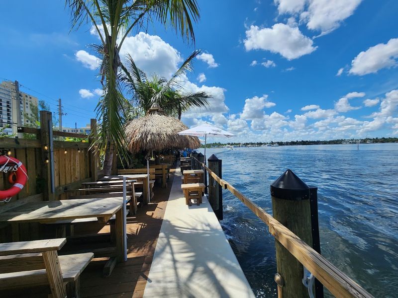 The Laid Back Rhythm Of Boats Sailing Past The Rail