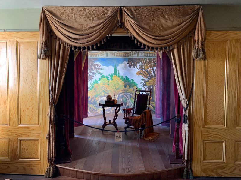 White Columns And A Red Brick Facade