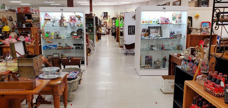 Long Aisles Stretch Past Glass Cases And Wooden Booths