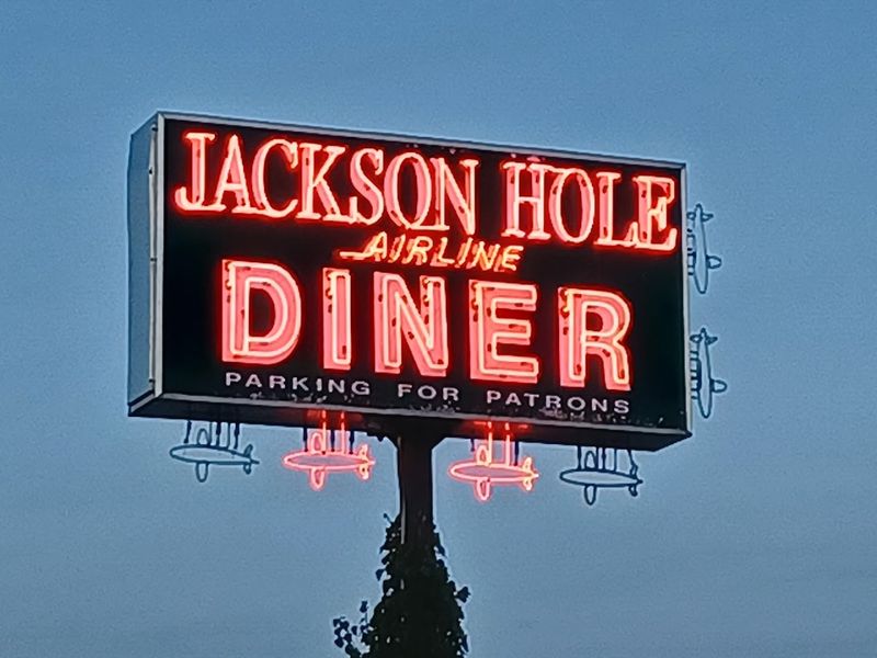 One Last Look At The Neon Glow Before The Flight Home