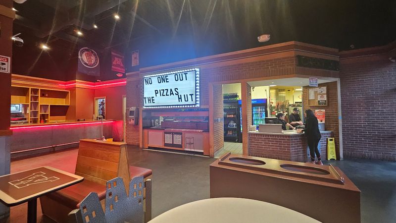 Cozy Red Booths And Old School Lamps
