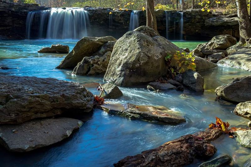 Sunlight Sparkling Across The Cool Mountain Water