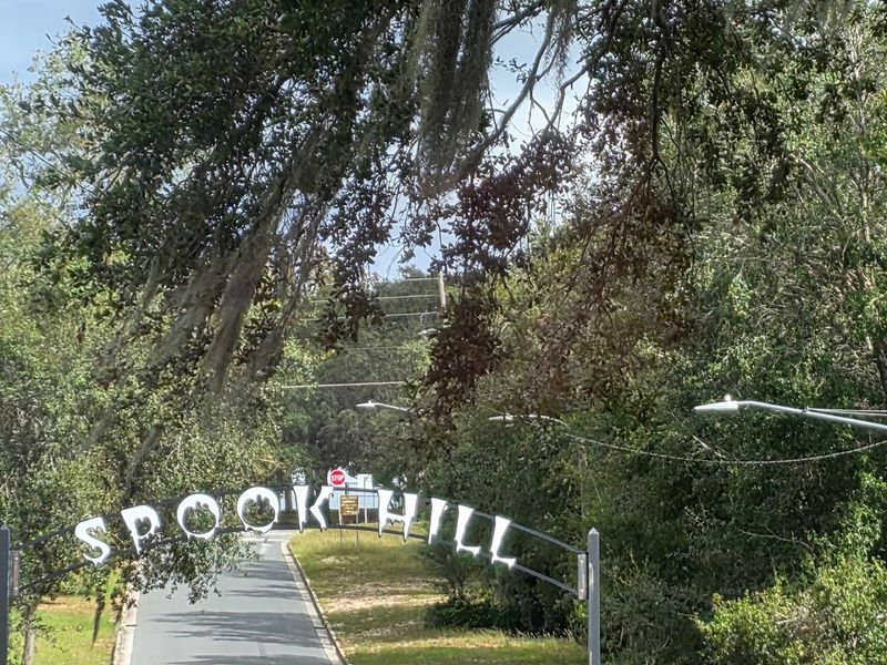 The Metal Arch That Spells Spook Hill Across The Sky