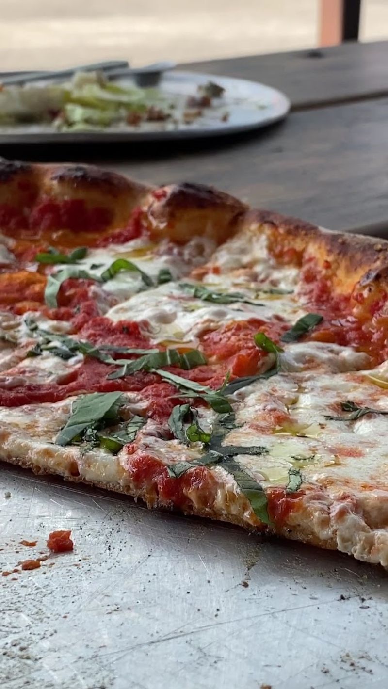 The Thin Crust Pops With A Satisfying Snap