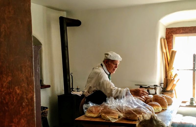 Costumed Bakers Welcome Guests At The Door
