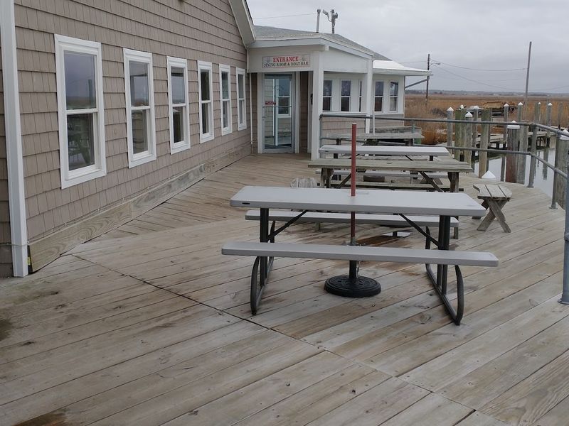 Indoor and Screened-In Outdoor Seating with Real Marsh Atmosphere