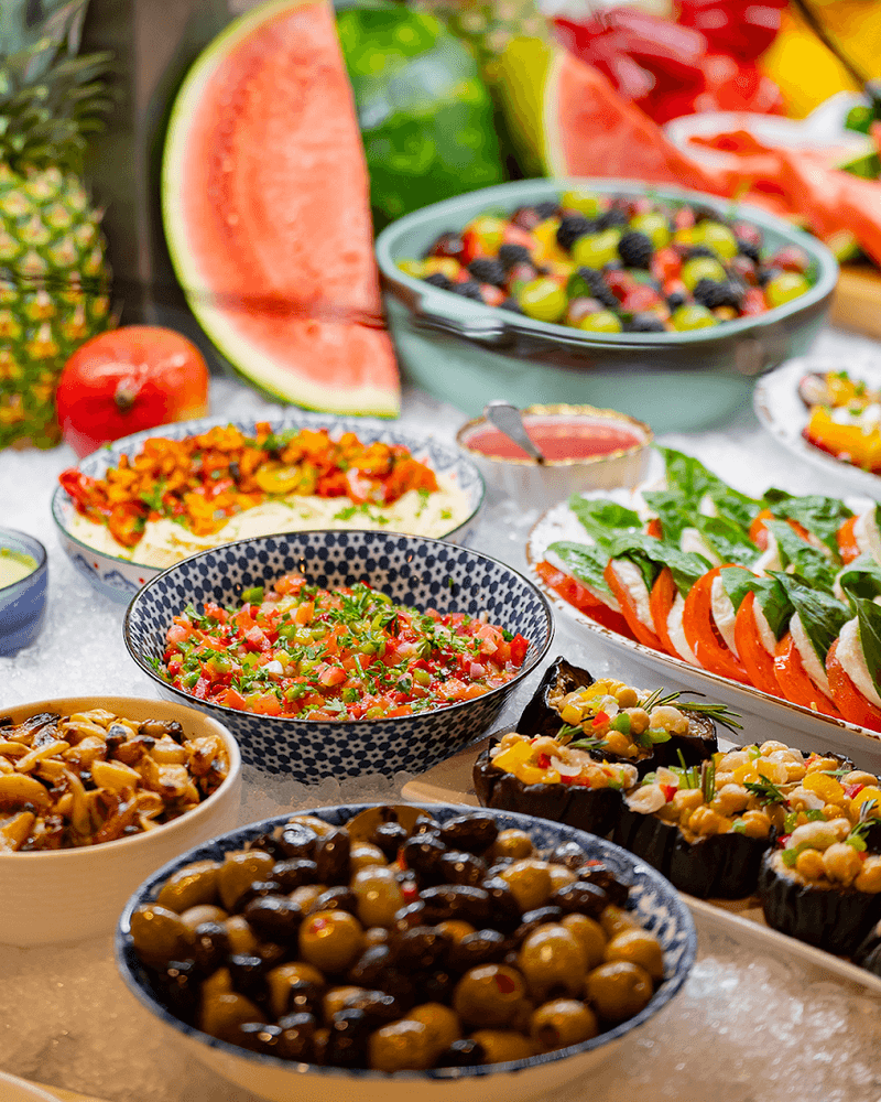 A Gourmet Market Table With Over 55 Items To Explore