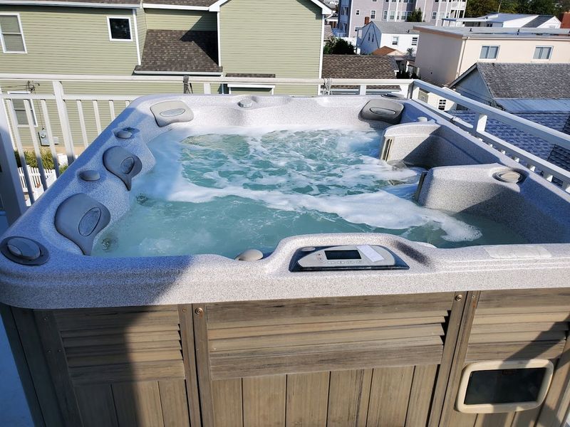 The Hot Tub and Sundeck: Relaxation with a Retro Backdrop