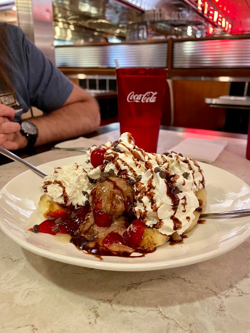 A Long Counter With Classic Swivel Stools For Everyone