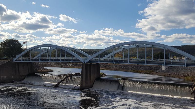 The Iron Truss Bridge: Crossing Above the Valley