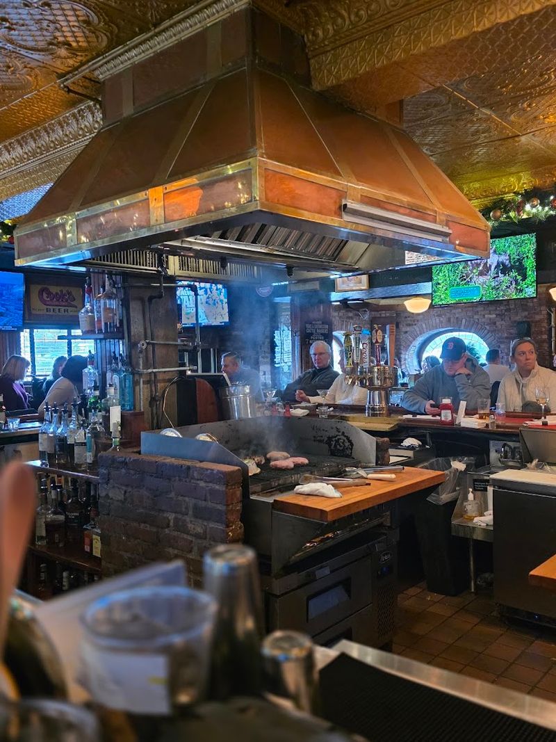 The Open Grill Setup Behind the Bar